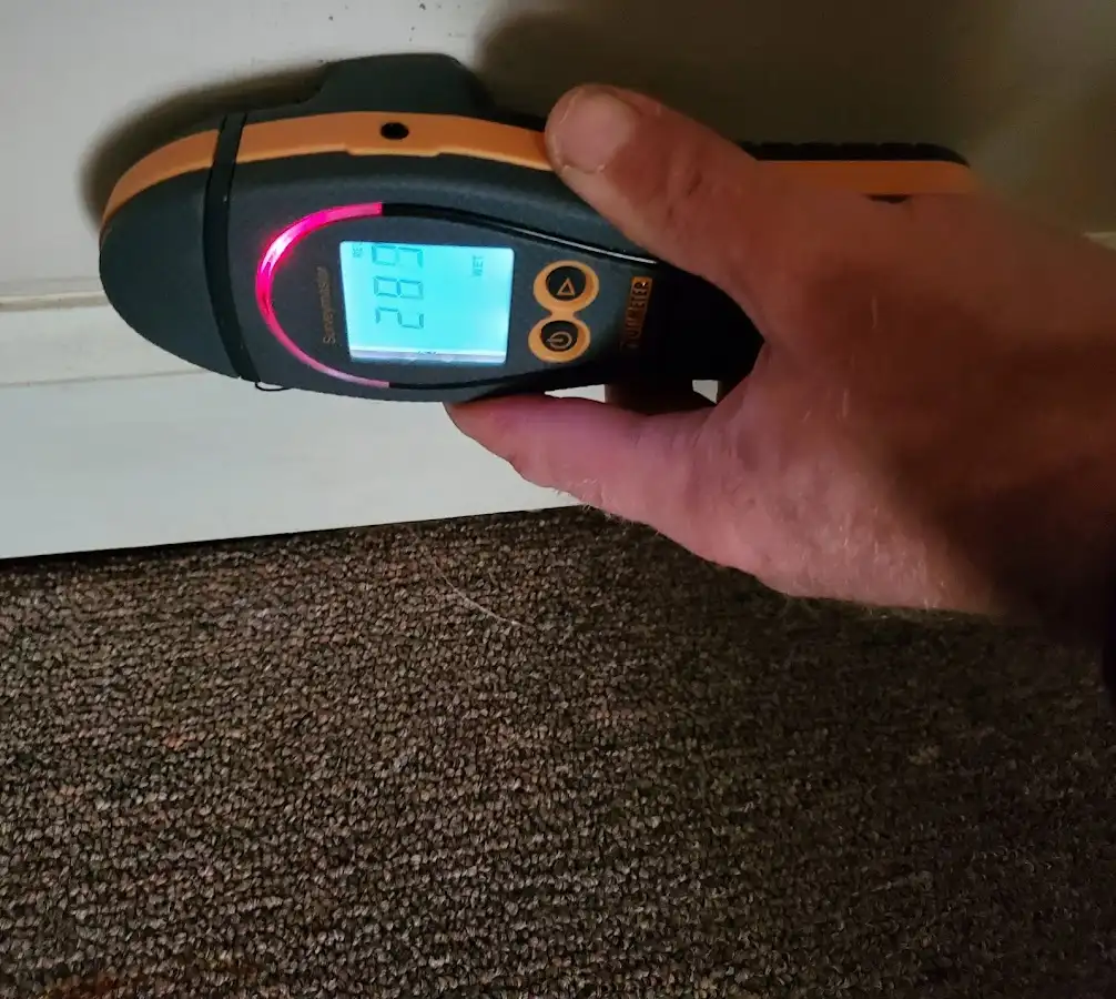 Moisture detection at baseboard during Burst Pipe Cleanup in Salem